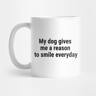 My dog gives me a reason to smile everyday Black Mug